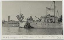 HMS Weymouth, torpedoed by a submarine. Shown in Brindisi harbor following the engagement. G.S. Dole Collection.