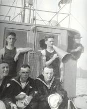 Crewmen forward of the pilot house